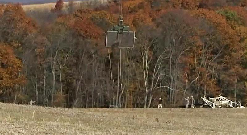 Illustration for article titled Army CH-47 Chinook Plucks What's Left Of Doomed JLENS Blimp From Forest